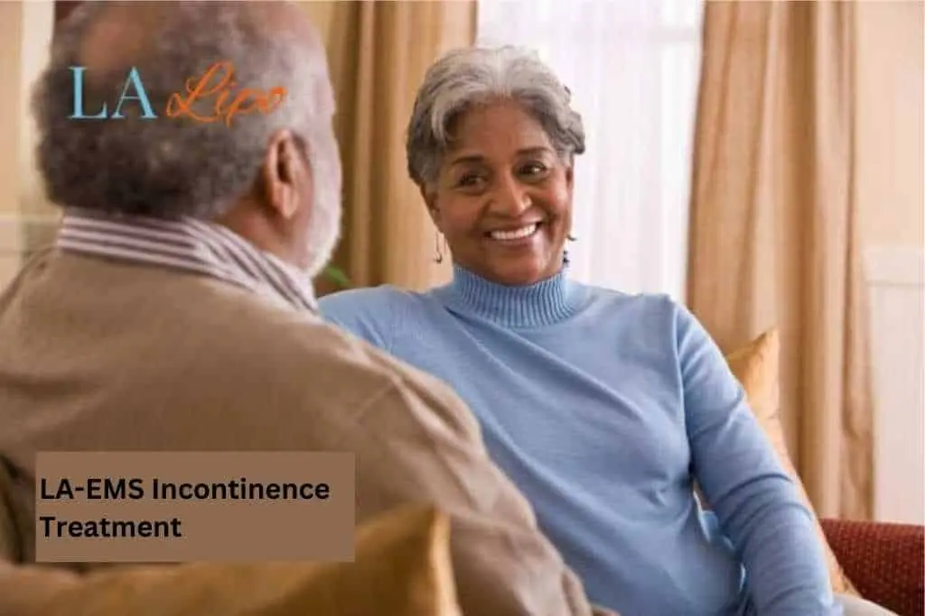 Couple sat smiling at each other - LA-EMS treatment Balsall